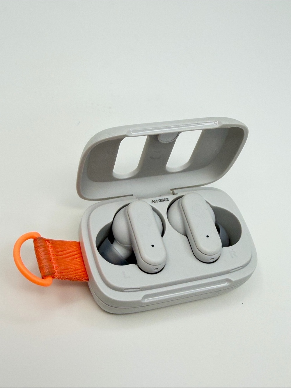 Skullcandy True Wireless Earbuds with Light Gray Case & Orange Loop